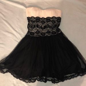 Medium black and white strapless homecoming dress